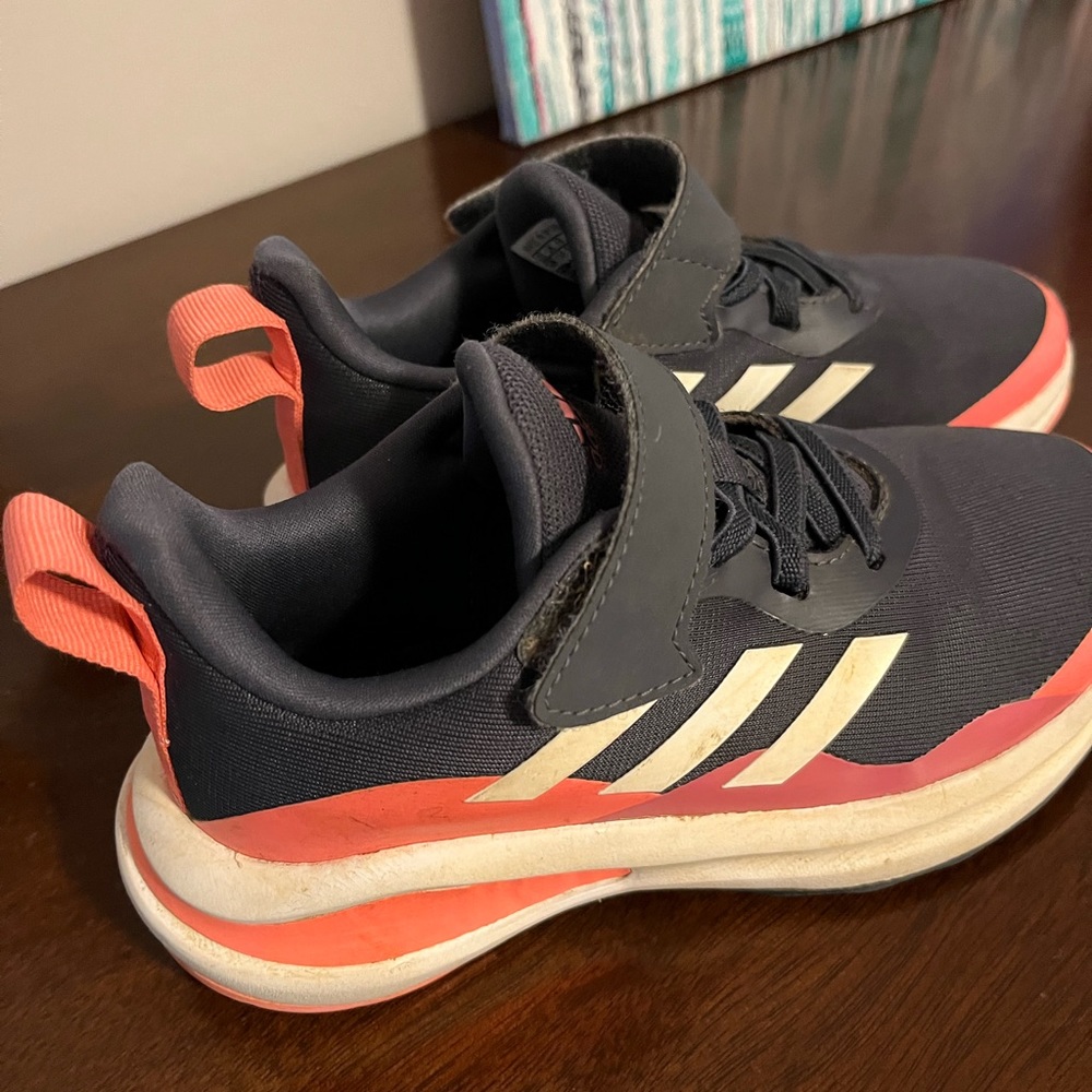 Kids Adidas athletic sneakers